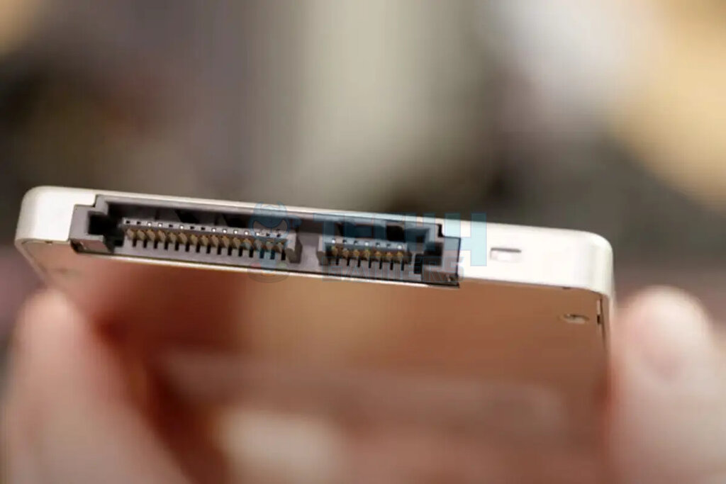 The SATA SSD has connections for power (left) and data (right) cables. 